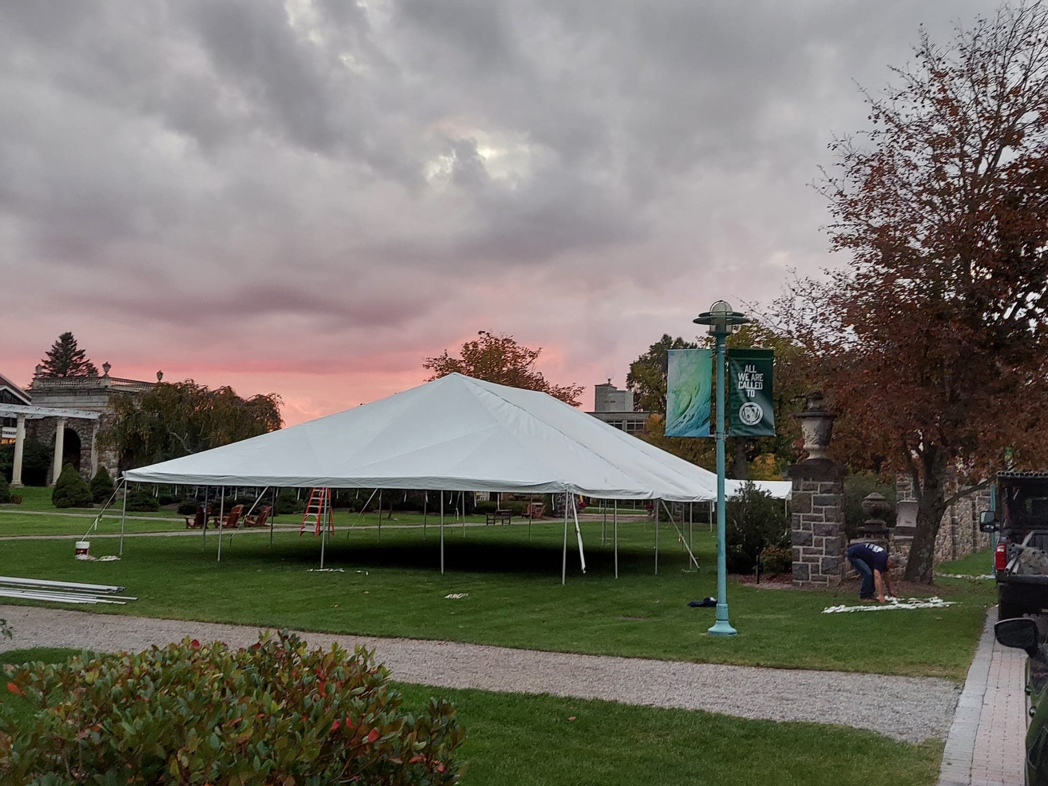 Beautiful backyard tent setup at golden hour
